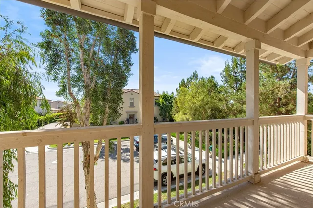 a bathroom with a sink double vanity granite tub shower and a mirror
