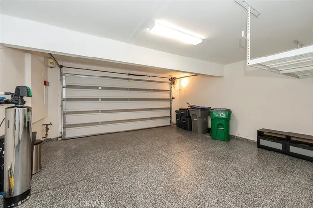 a view of an empty room with a staircase