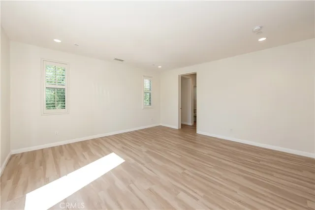 a view of an empty walk in closet