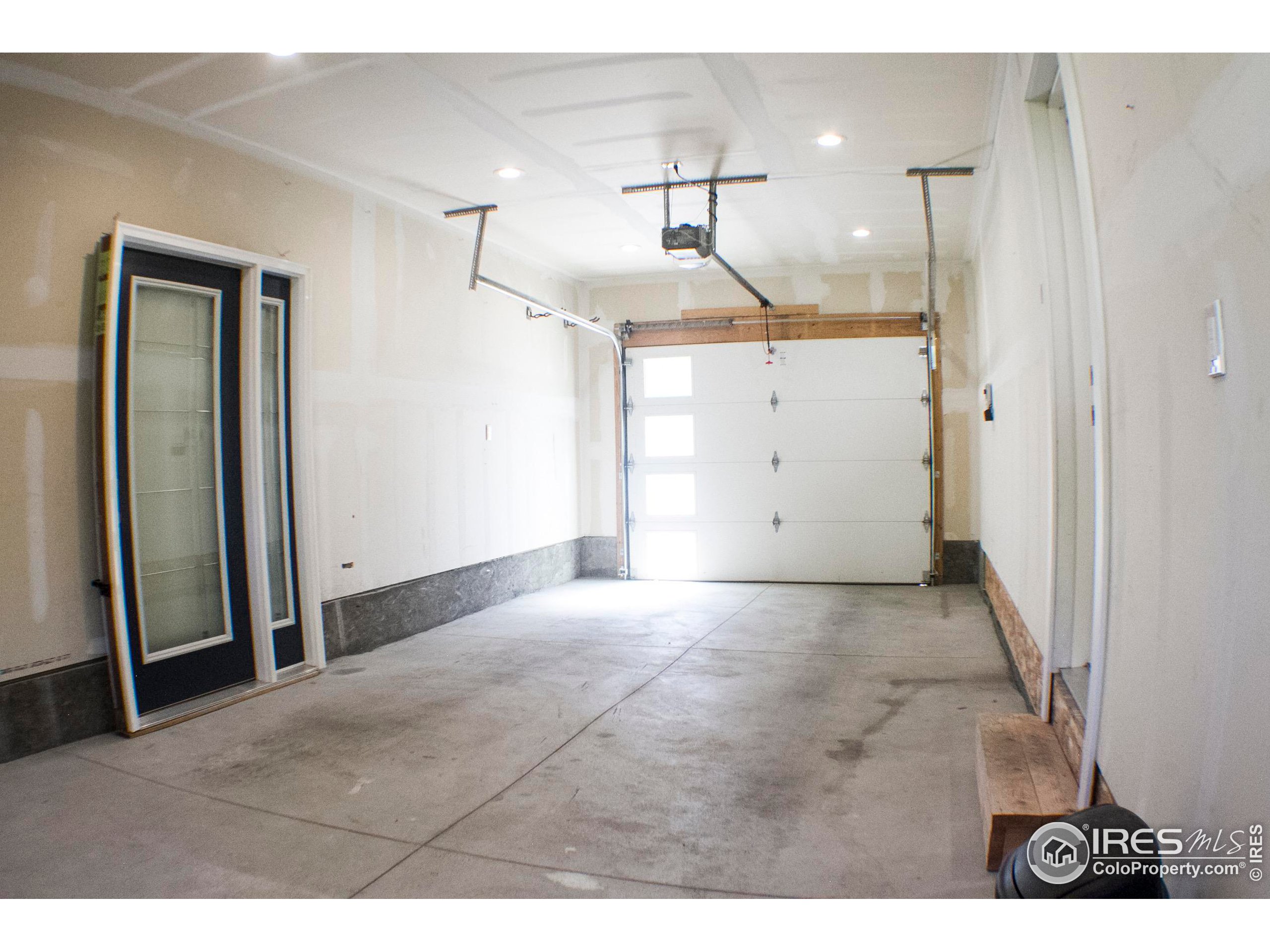 313 West Furry Street Holyoke, CO 80734 - Photo 22 of 23 a view of a big room with closet and wooden floor