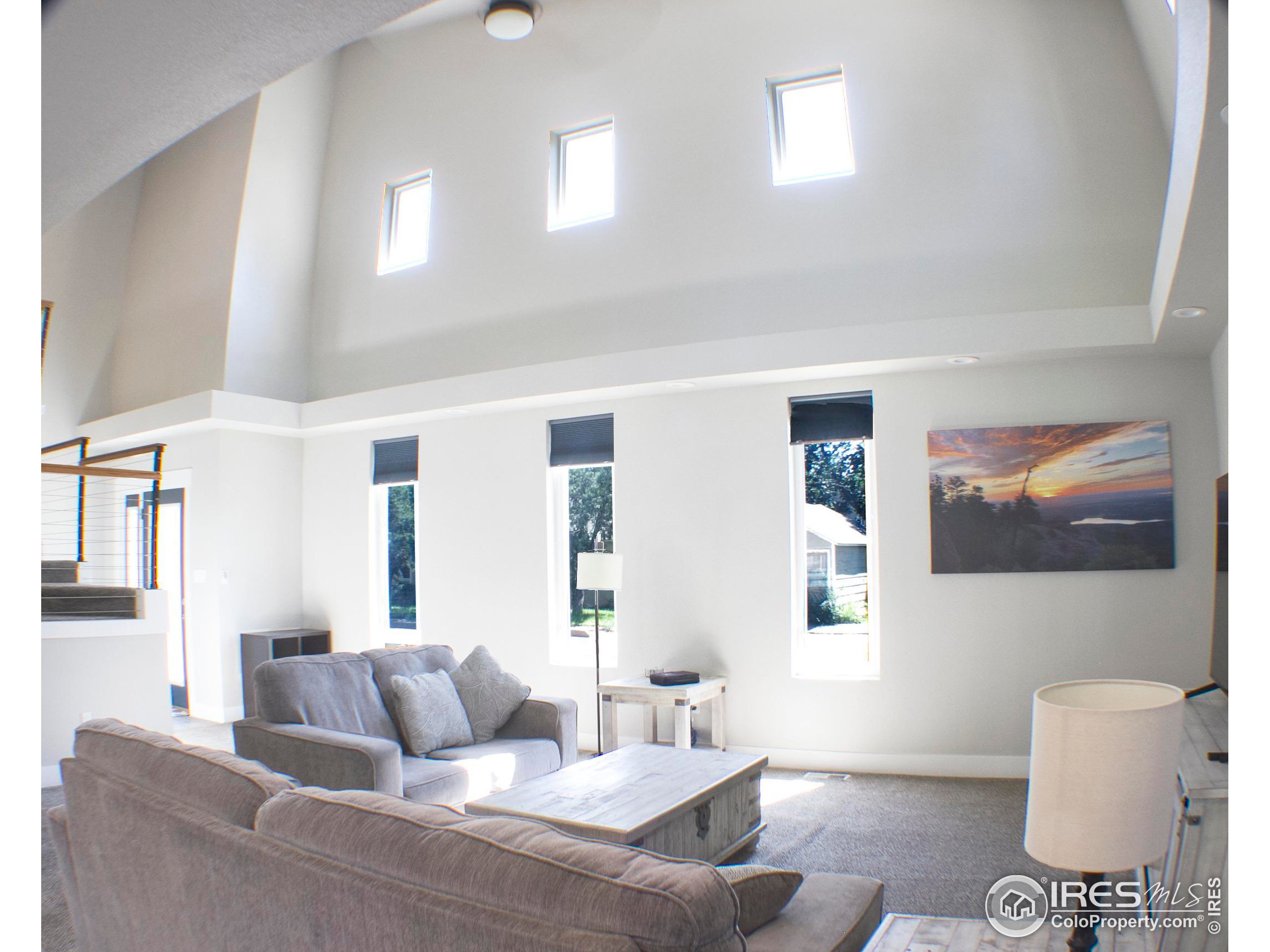 313 West Furry Street Holyoke, CO 80734 - Photo 5 of 23 a living room with furniture and a couch