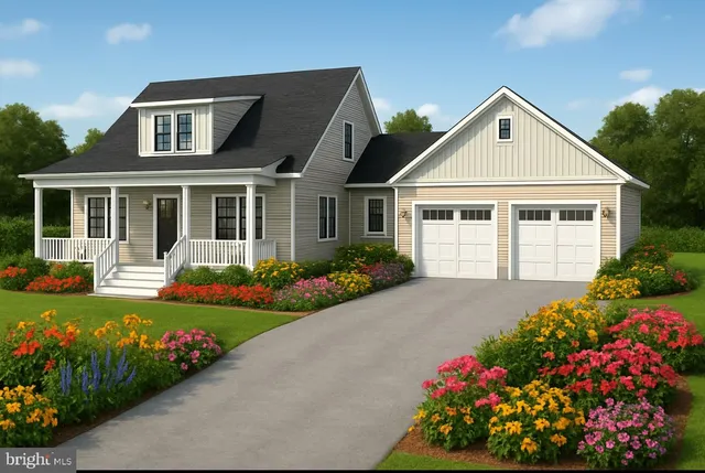 a front view of a house with a yard and fountain