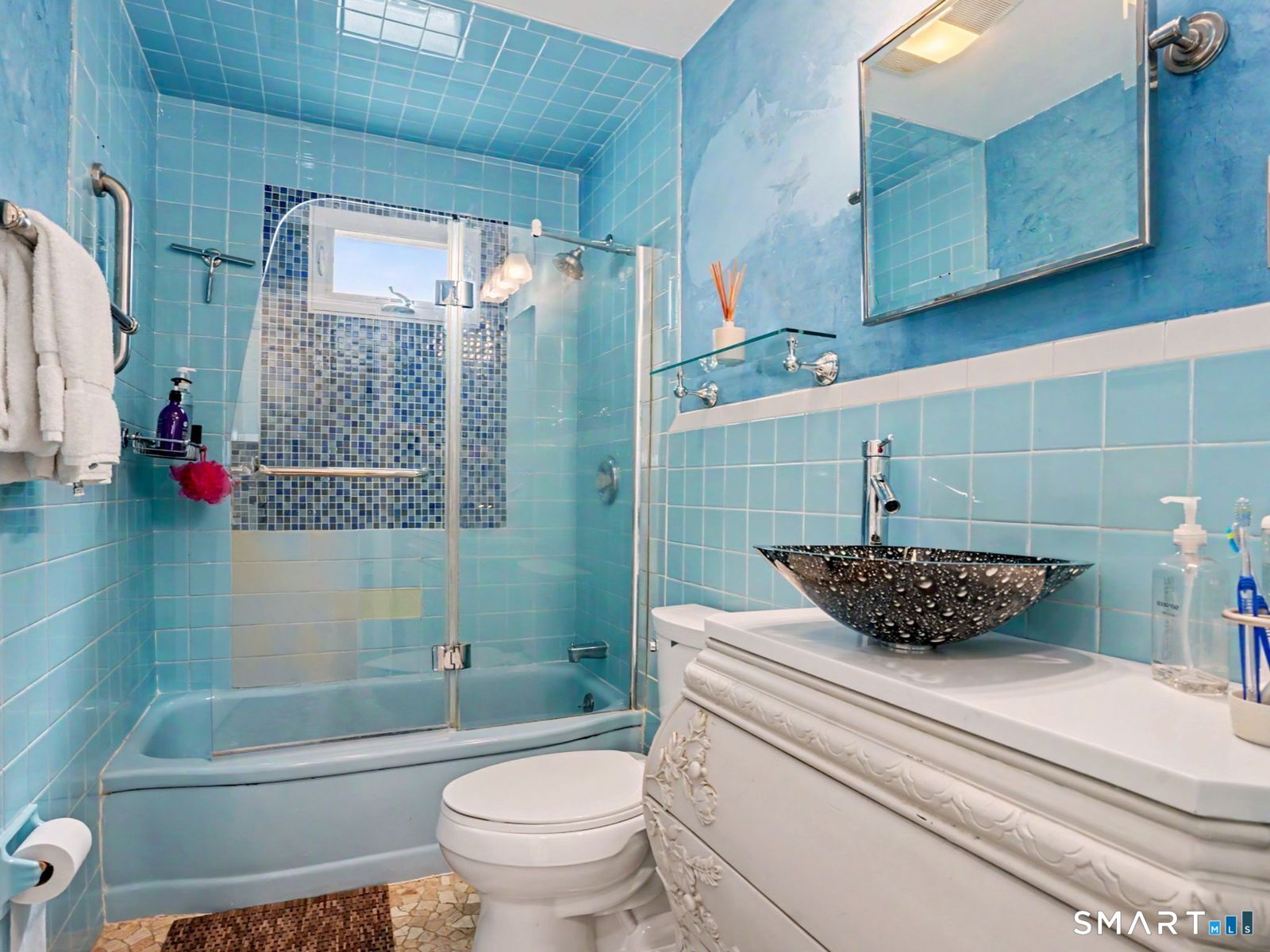 43 George Avenue Norwalk, CT 06851 - Photo 17 of 39 a bathroom with a toilet and a shower