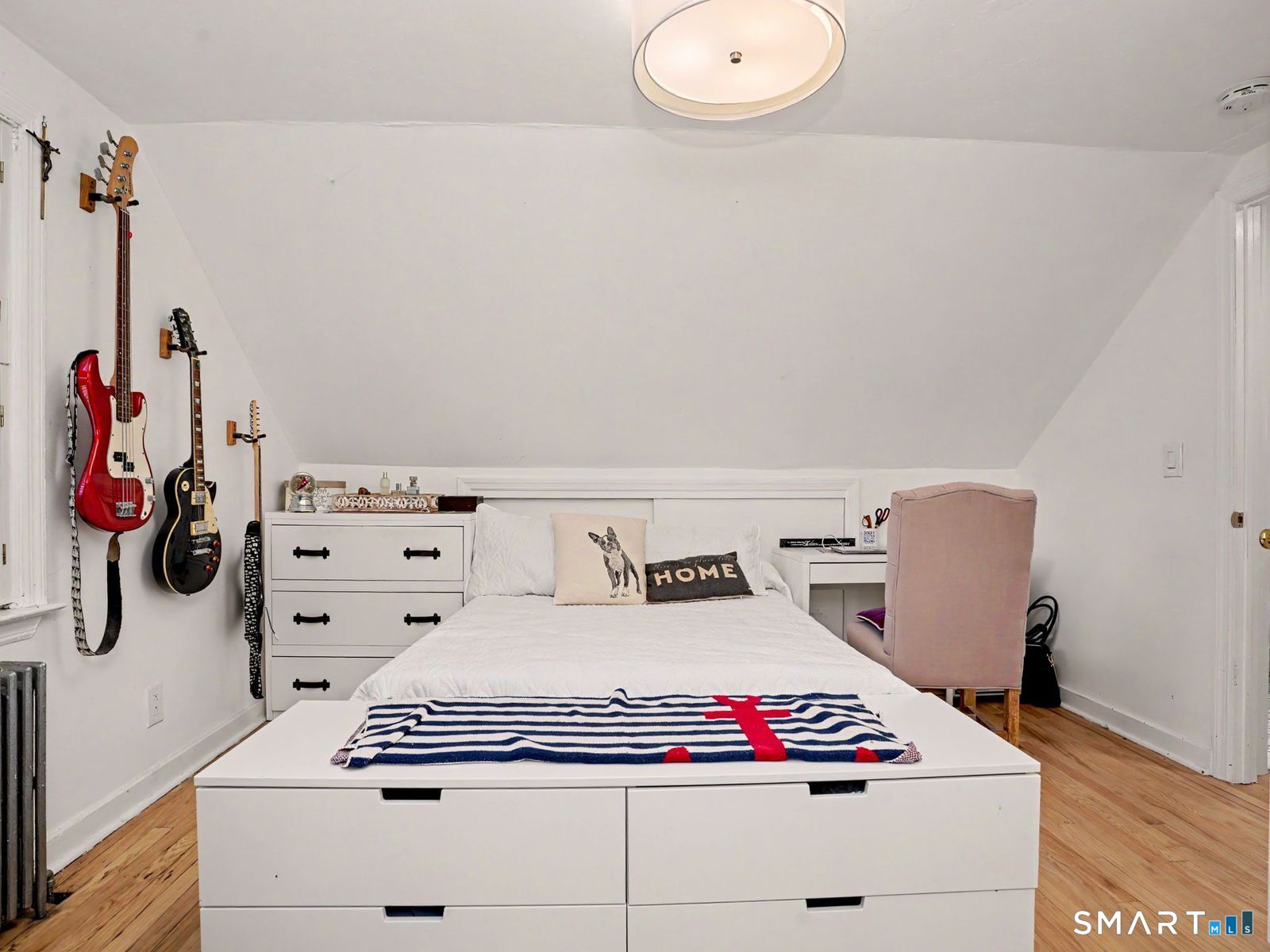 43 George Avenue Norwalk, CT 06851 - Photo 20 of 39 a bedroom with a bed and cabinets