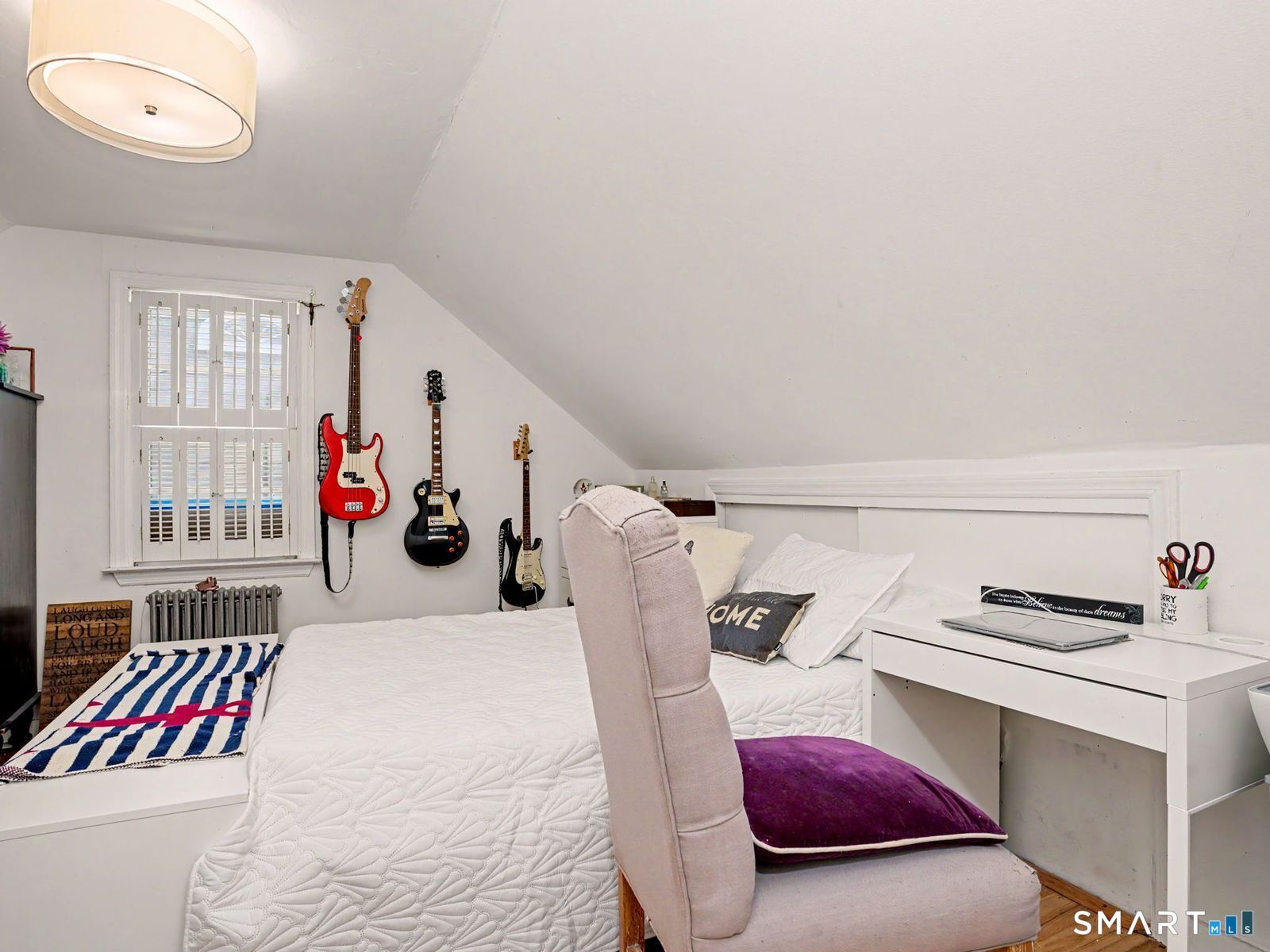 43 George Avenue Norwalk, CT 06851 - Photo 21 of 39 a bedroom with furniture and a book shelf