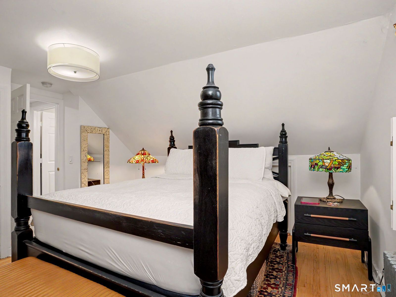 43 George Avenue Norwalk, CT 06851 - Photo 24 of 39 a bedroom with a bed and a dresser