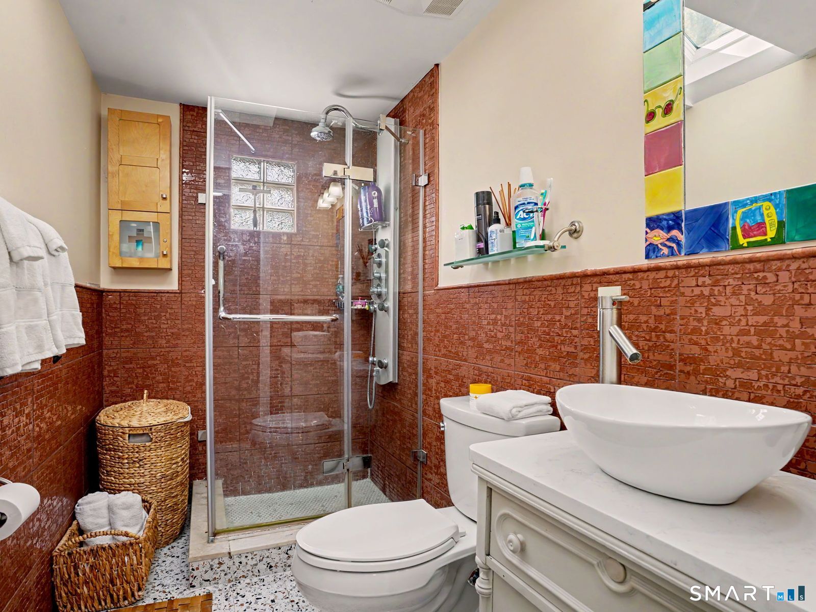 43 George Avenue Norwalk, CT 06851 - Photo 25 of 39 a bathroom with a toilet and shower