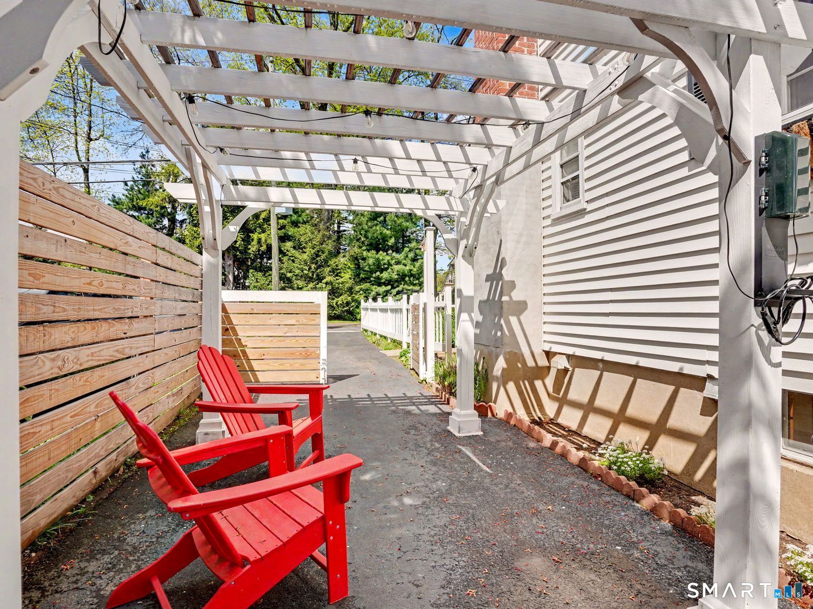 43 George Avenue Norwalk, CT 06851 - Photo 36 of 39 a view of a patio with a table and chairs