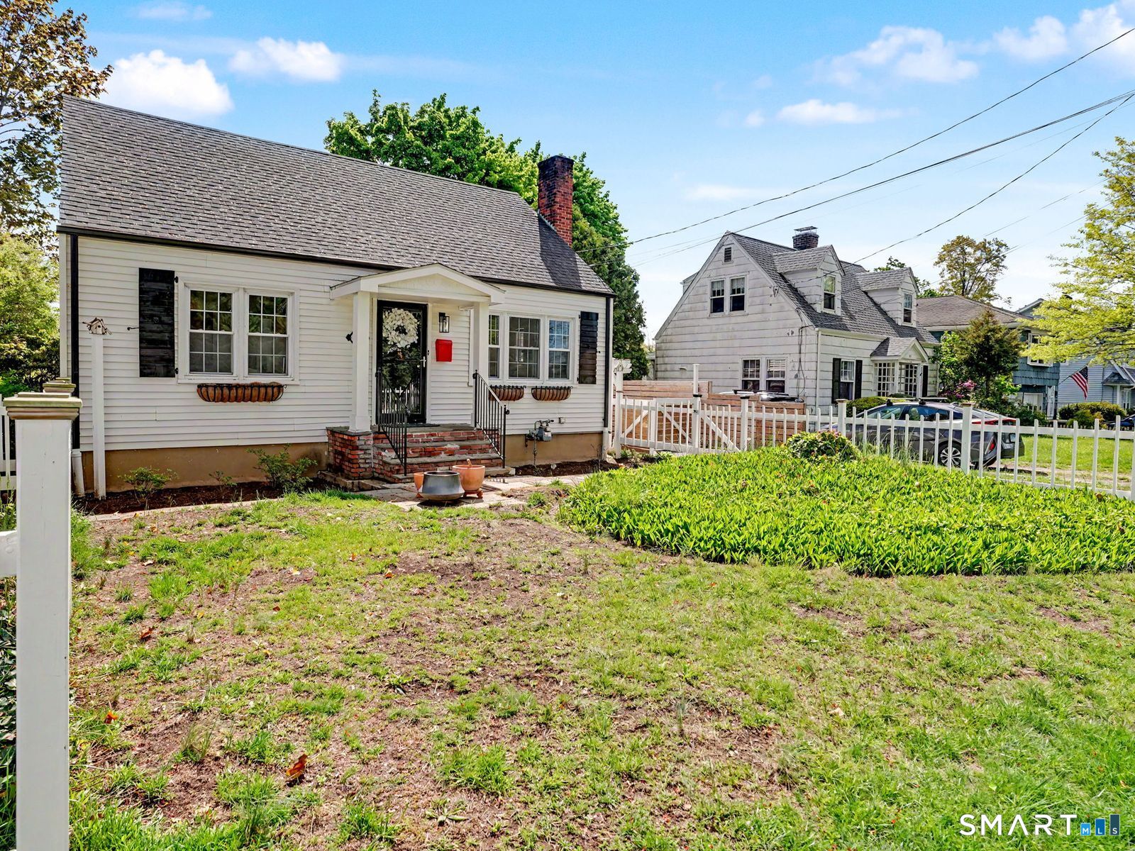 43 George Avenue Norwalk, CT 06851 - Photo 39 of 39 a front view of house with yard and green space