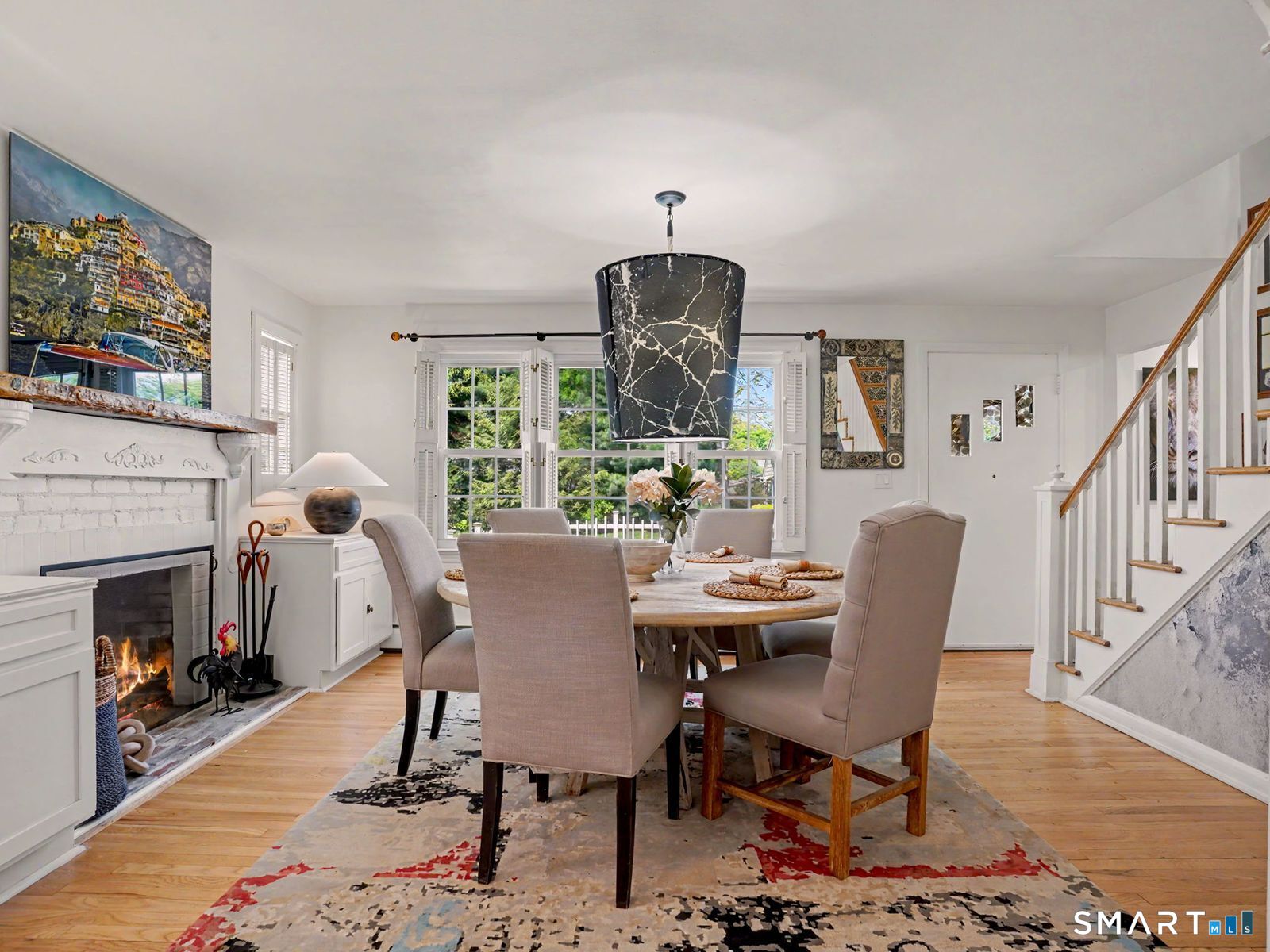 43 George Avenue Norwalk, CT 06851 - Photo 5 of 39 a view of a dining room with furniture window and wooden floor