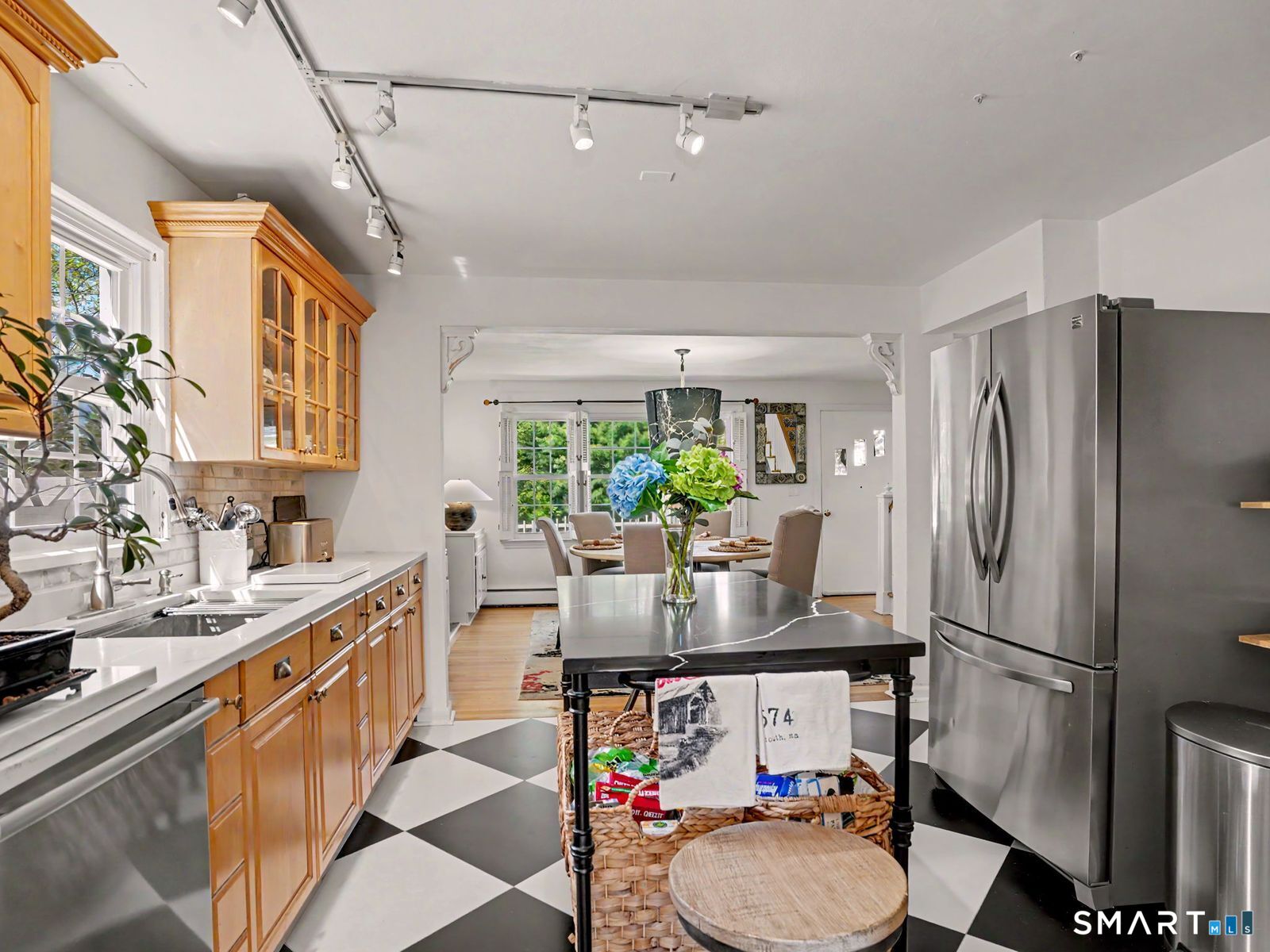43 George Avenue Norwalk, CT 06851 - Photo 6 of 39 a kitchen with stainless steel appliances a refrigerator and a sink