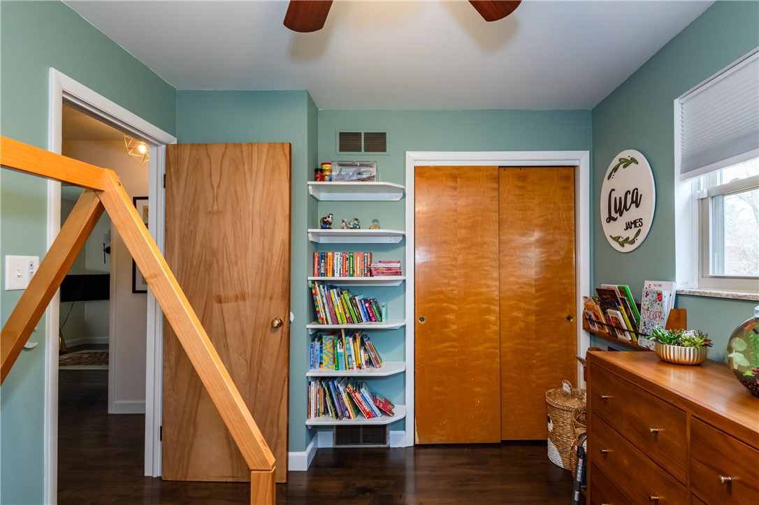 4102 Ridgetop Drive Bellbrook, OH 45305 - Photo 22 of 33 This cozy bedroom features warm wooden floors and a tranquil ambiance perfect for rest.