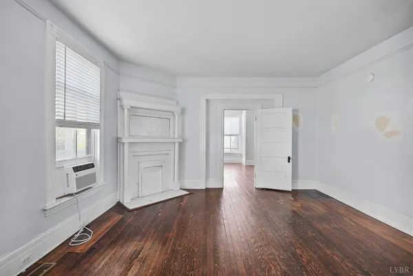 a view of balcony with wooden floor
