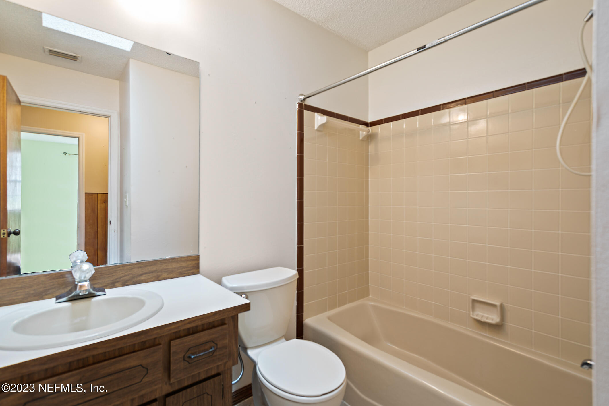 209 Jasmine Road St. Augustine, FL 32086 - Photo 18 of 35 a bathroom with a sink and a mirror