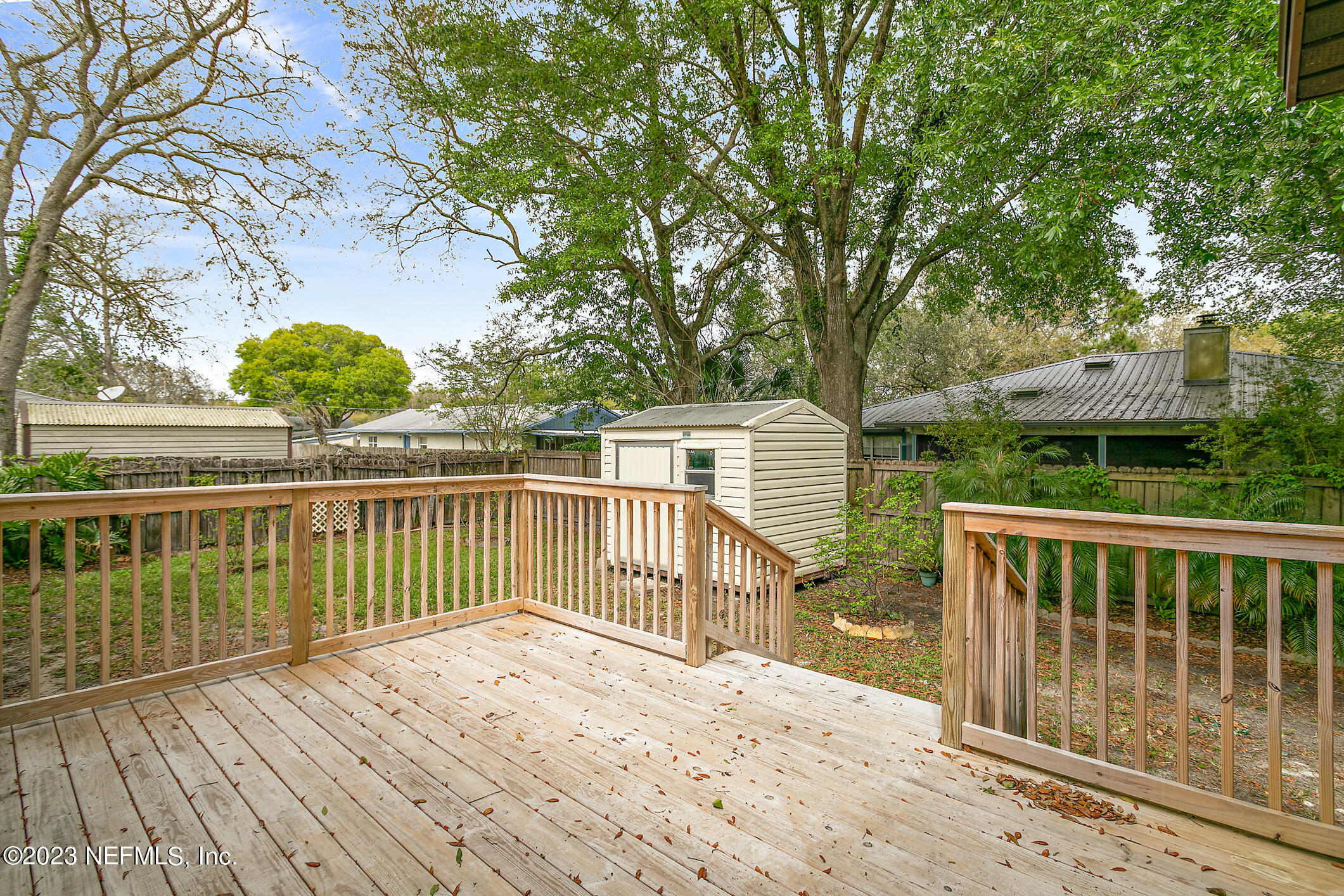 209 Jasmine Road St. Augustine, FL 32086 - Photo 26 of 35 a view of balcony with wooden floor and fence