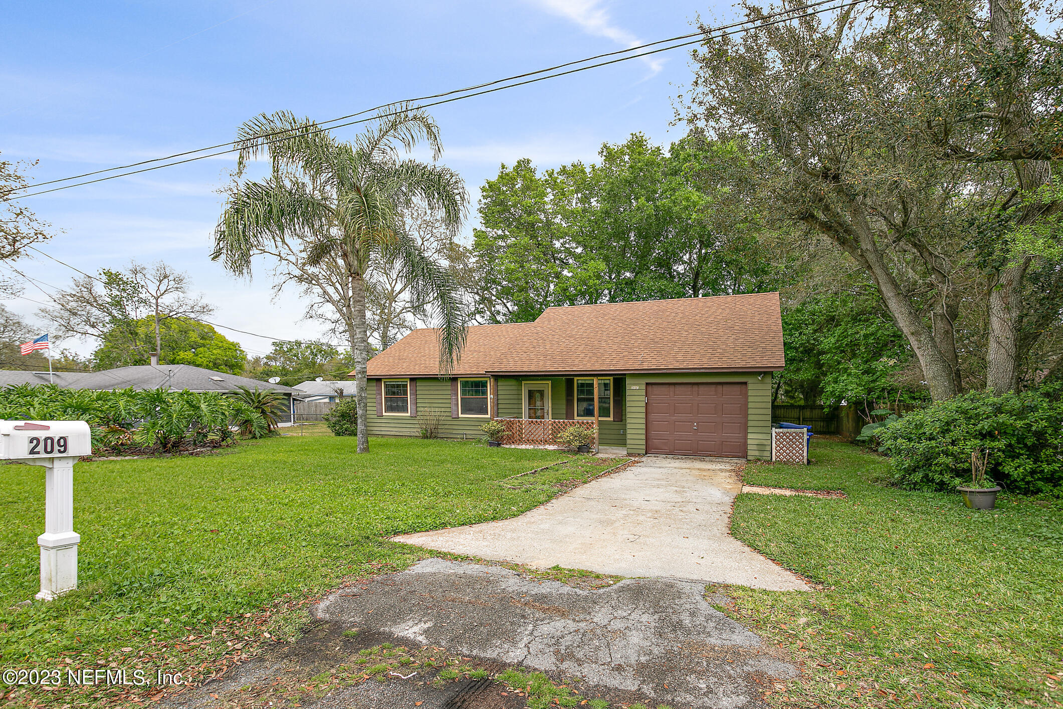 209 Jasmine Road St. Augustine, FL 32086 - Photo 34 of 35 a house that has a tree in it