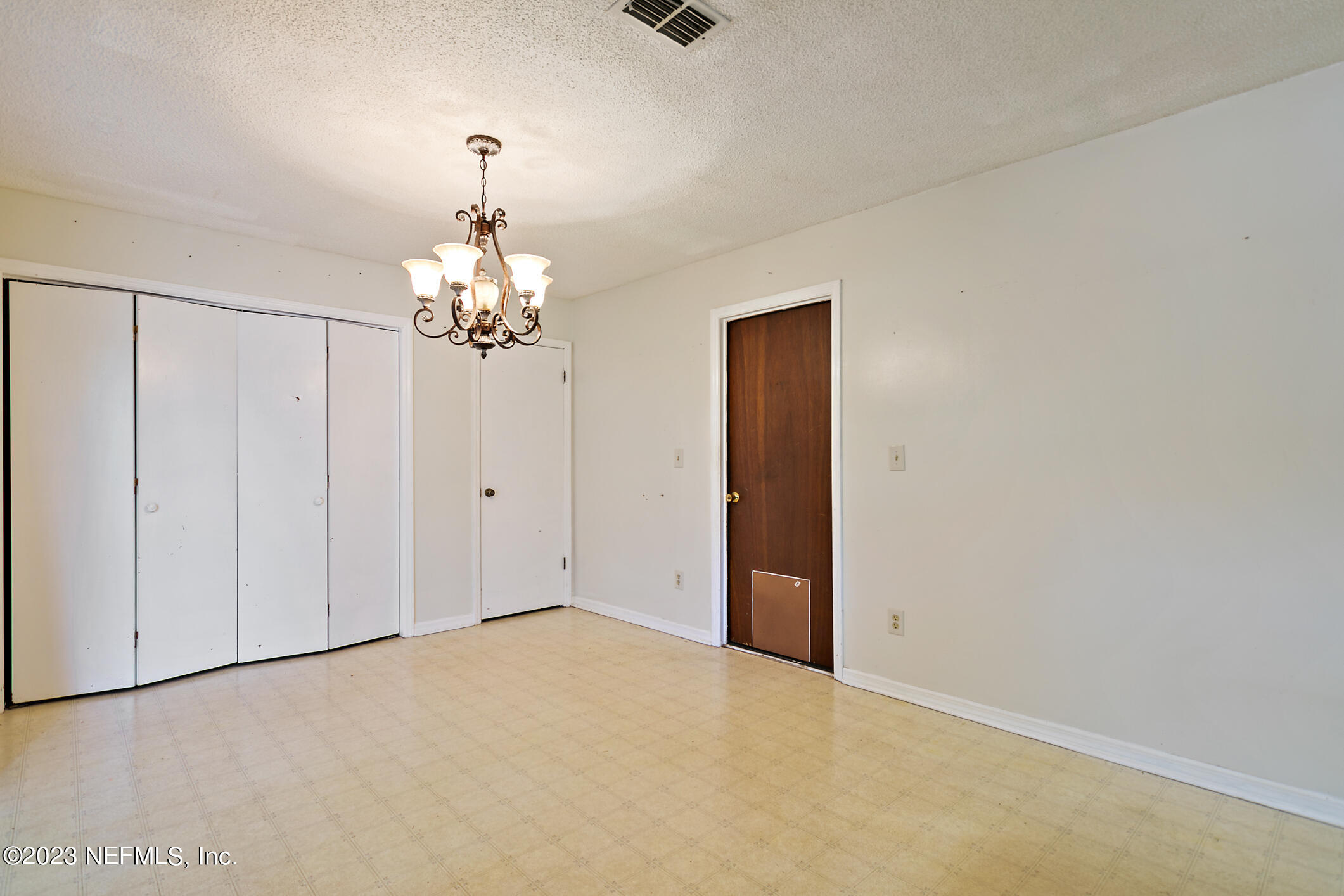 209 Jasmine Road St. Augustine, FL 32086 - Photo 10 of 35 a view of a chandelier in big room and chandelier