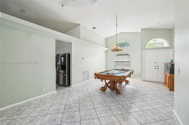 a room with furniture and a chandelier