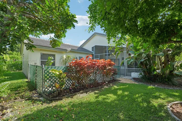 a view of a backyard with a garden