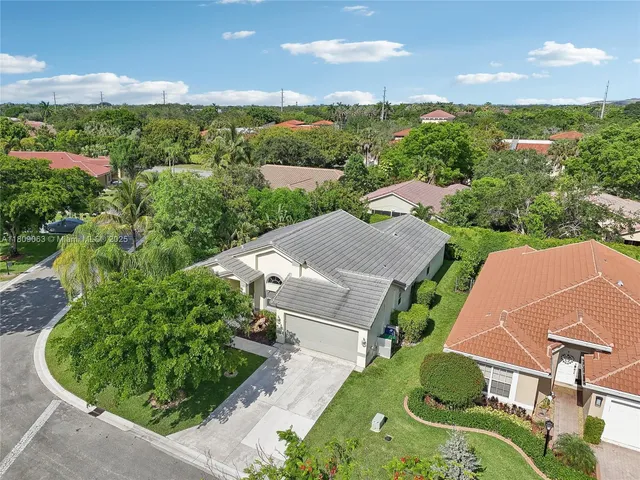 an aerial view of a house with garden