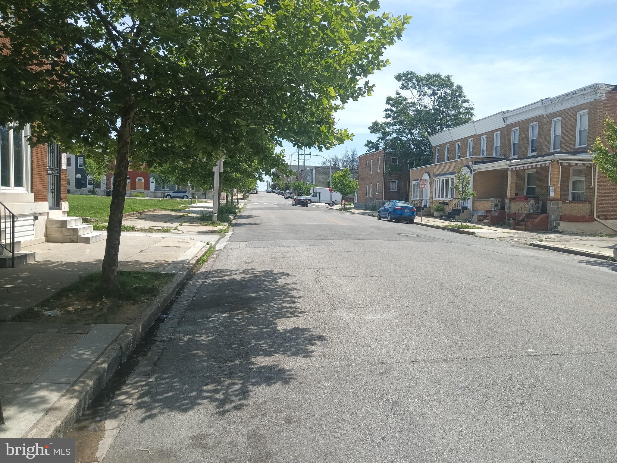 2414 East Oliver Street Baltimore, MD 21213 - Photo 8 of 9 a view of a street with a building in the background