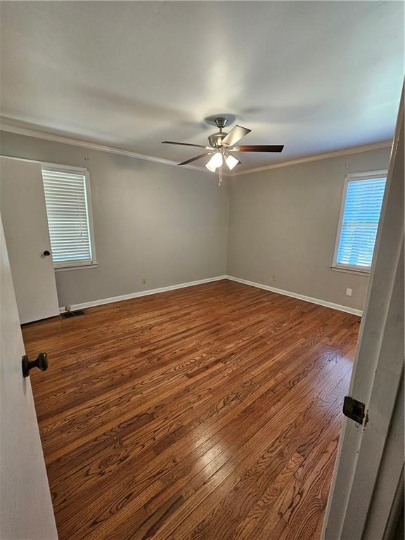 2107 Flat Shoals Road Southwest Conyers, GA 30094 - Photo 16 of 21 wooden floor in an empty room with a window