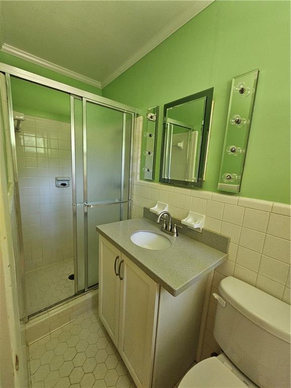 2107 Flat Shoals Road Southwest Conyers, GA 30094 - Photo 18 of 21 a bathroom with a granite countertop sink toilet and shower