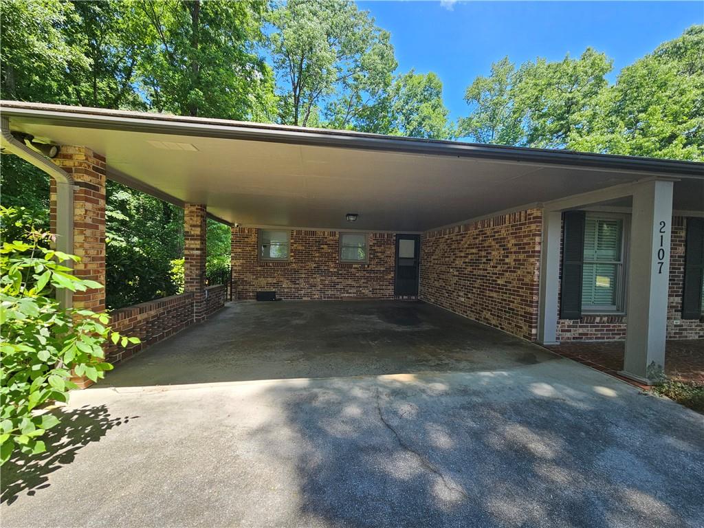 2107 Flat Shoals Road Southwest Conyers, GA 30094 - Photo 4 of 21 a view of a yard with fountain