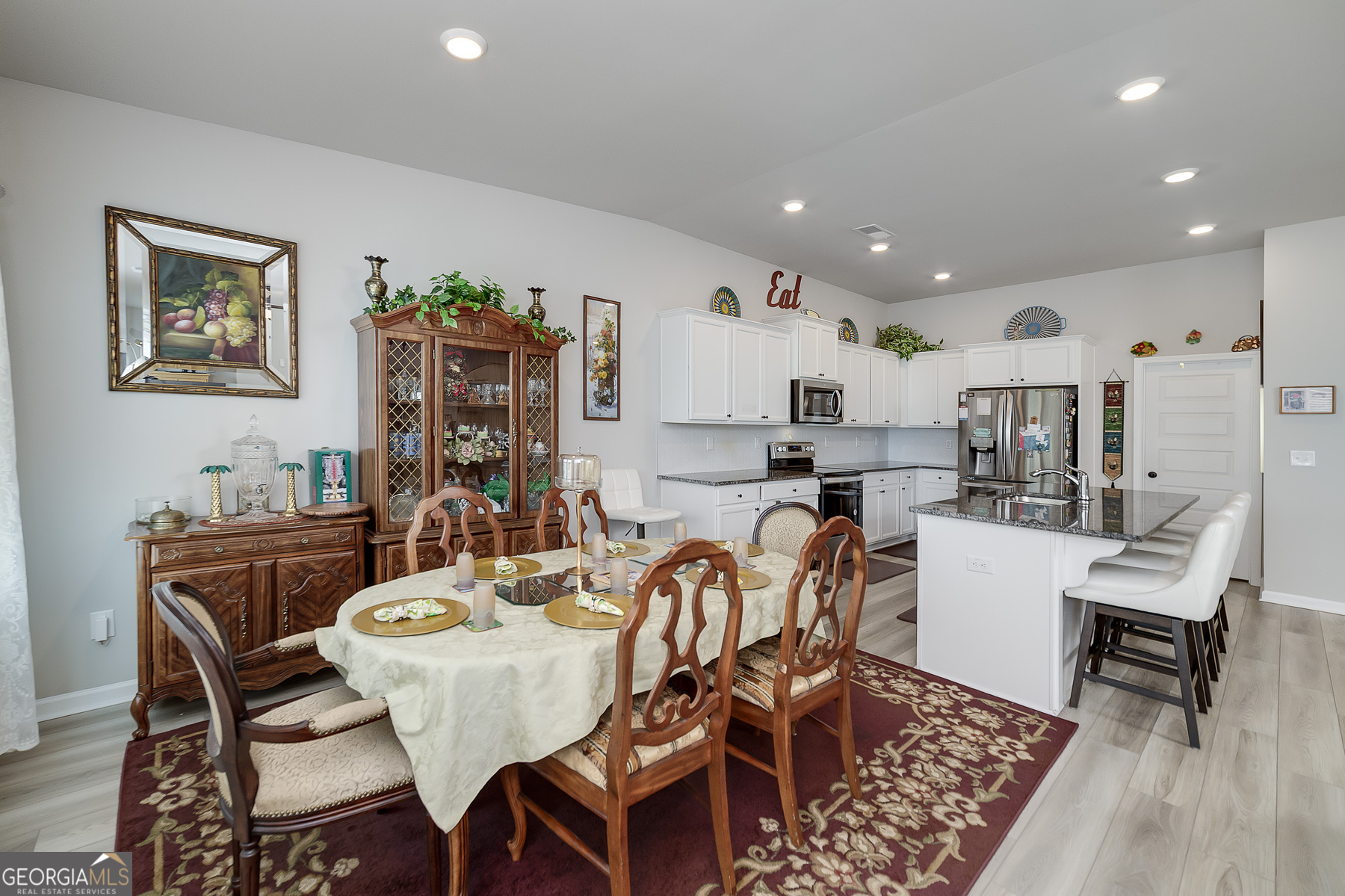 1517 Stinson Lane, Unit PHASE Locust Grove, GA 30248 - Photo 20 of 46 a view of a dining room with furniture