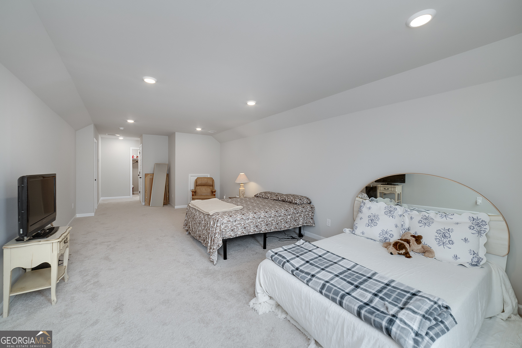 1517 Stinson Lane, Unit PHASE Locust Grove, GA 30248 - Photo 37 of 46 a bedroom with a bed and a television