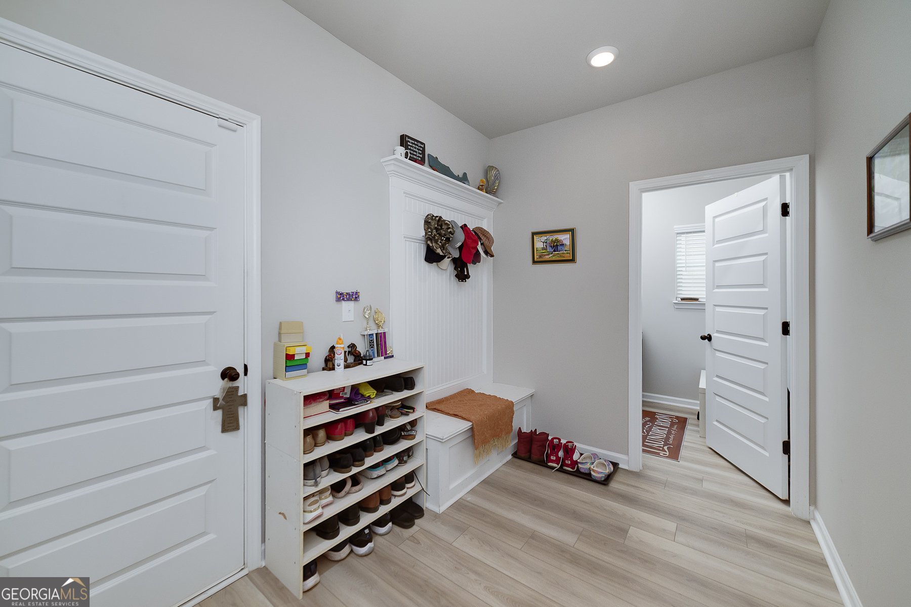 1517 Stinson Lane, Unit PHASE Locust Grove, GA 30248 - Photo 40 of 46 a room with stairs and wooden floor