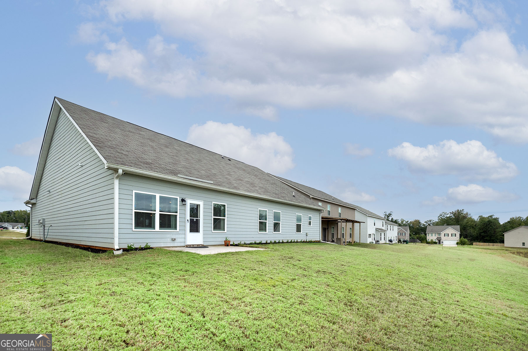 1517 Stinson Lane, Unit PHASE Locust Grove, GA 30248 - Photo 4 of 46 a view of a house with backyard