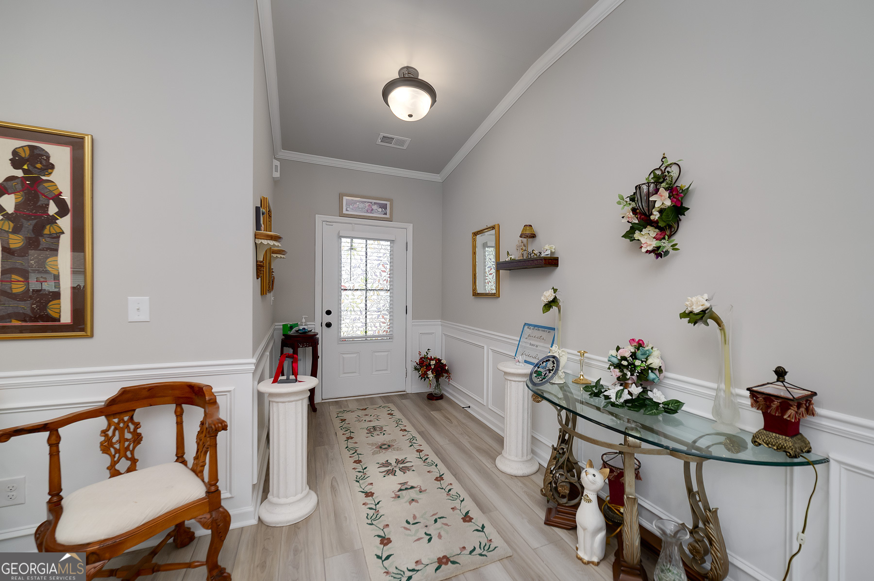 1517 Stinson Lane, Unit PHASE Locust Grove, GA 30248 - Photo 9 of 46 a living room with furniture flowerpot and wooden floor