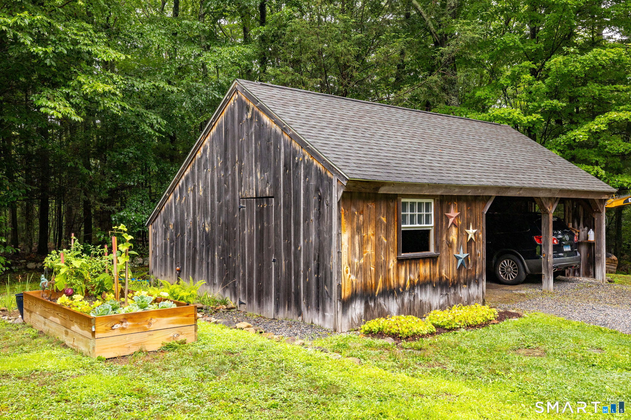 183 Steele Road New Hartford, CT 06057 - Photo 33 of 40 22' x 30' outbuilding w/ 2 car bays plus additional storage space.