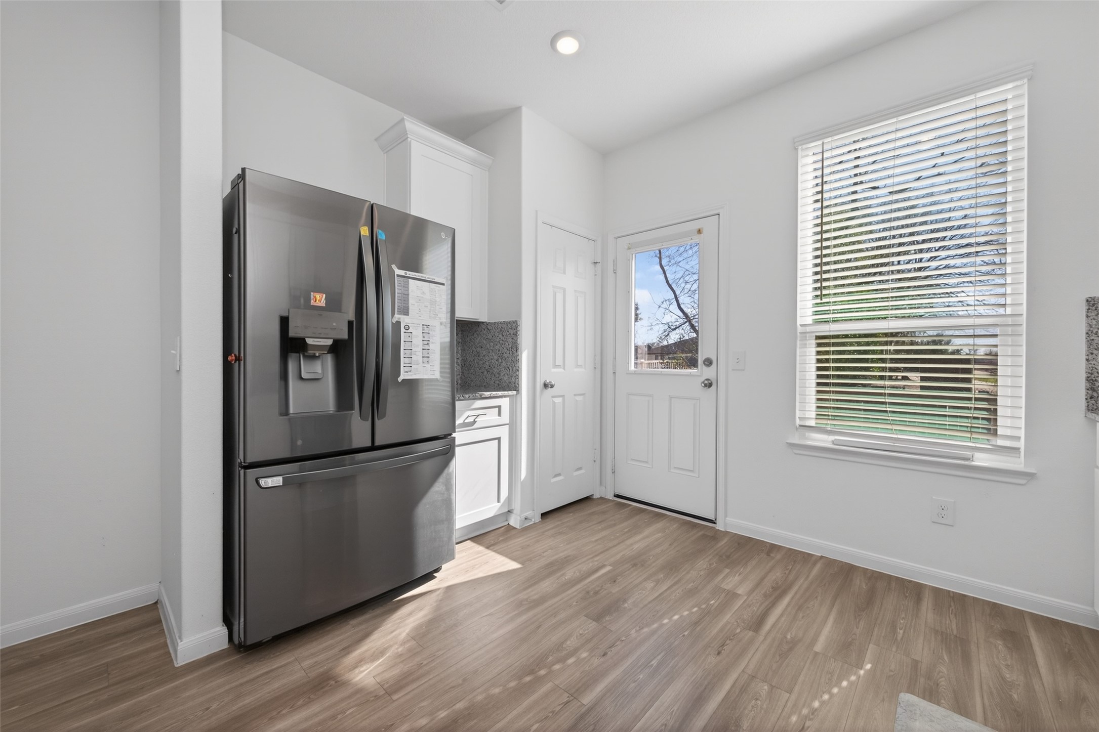 7326 Madison Cmns Lane Houston, TX 77075 - Photo 16 of 45 White cabinets complement the kitchen