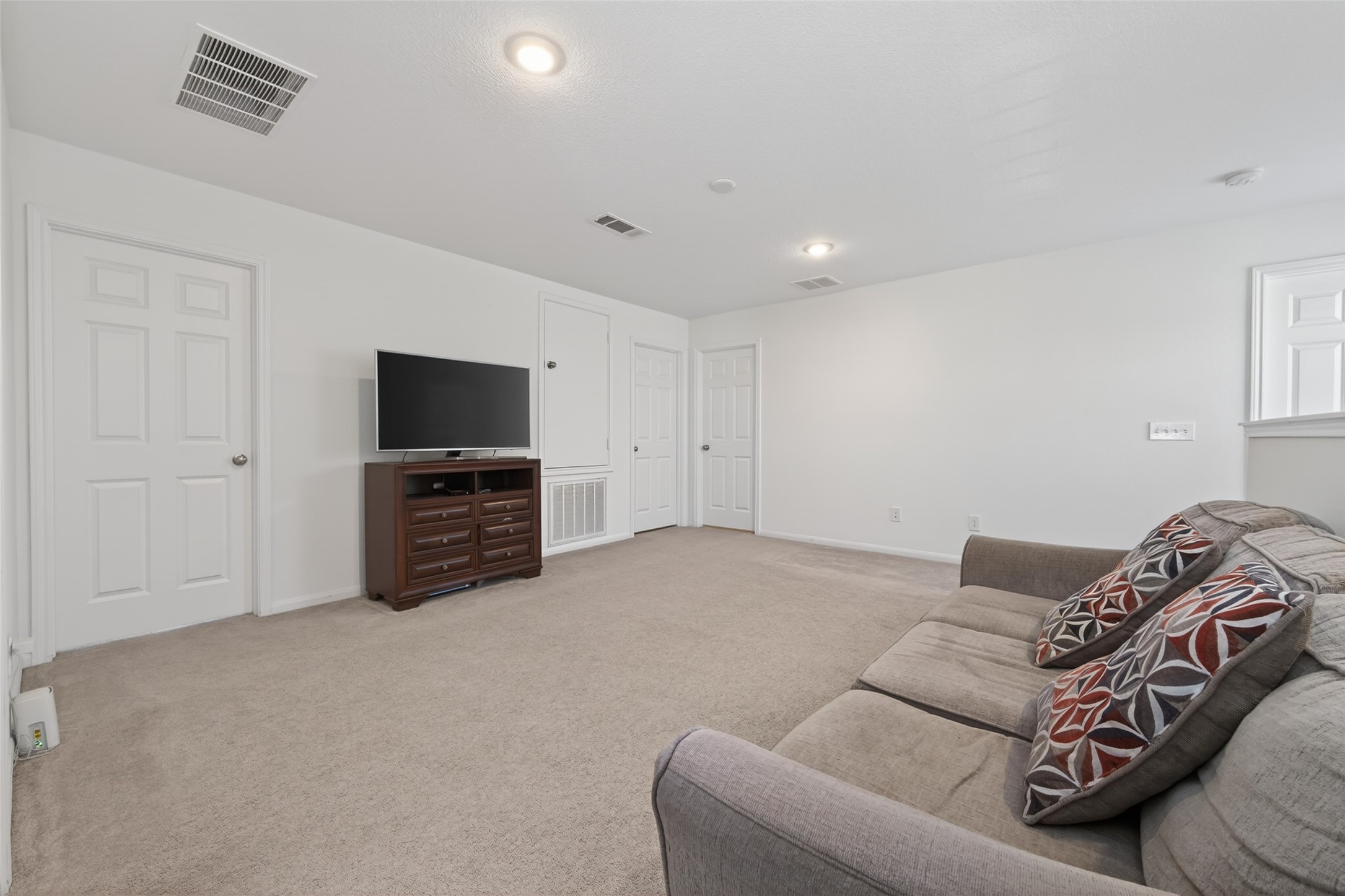 7326 Madison Cmns Lane Houston, TX 77075 - Photo 21 of 45 Game room is used as a media room on the second floor.