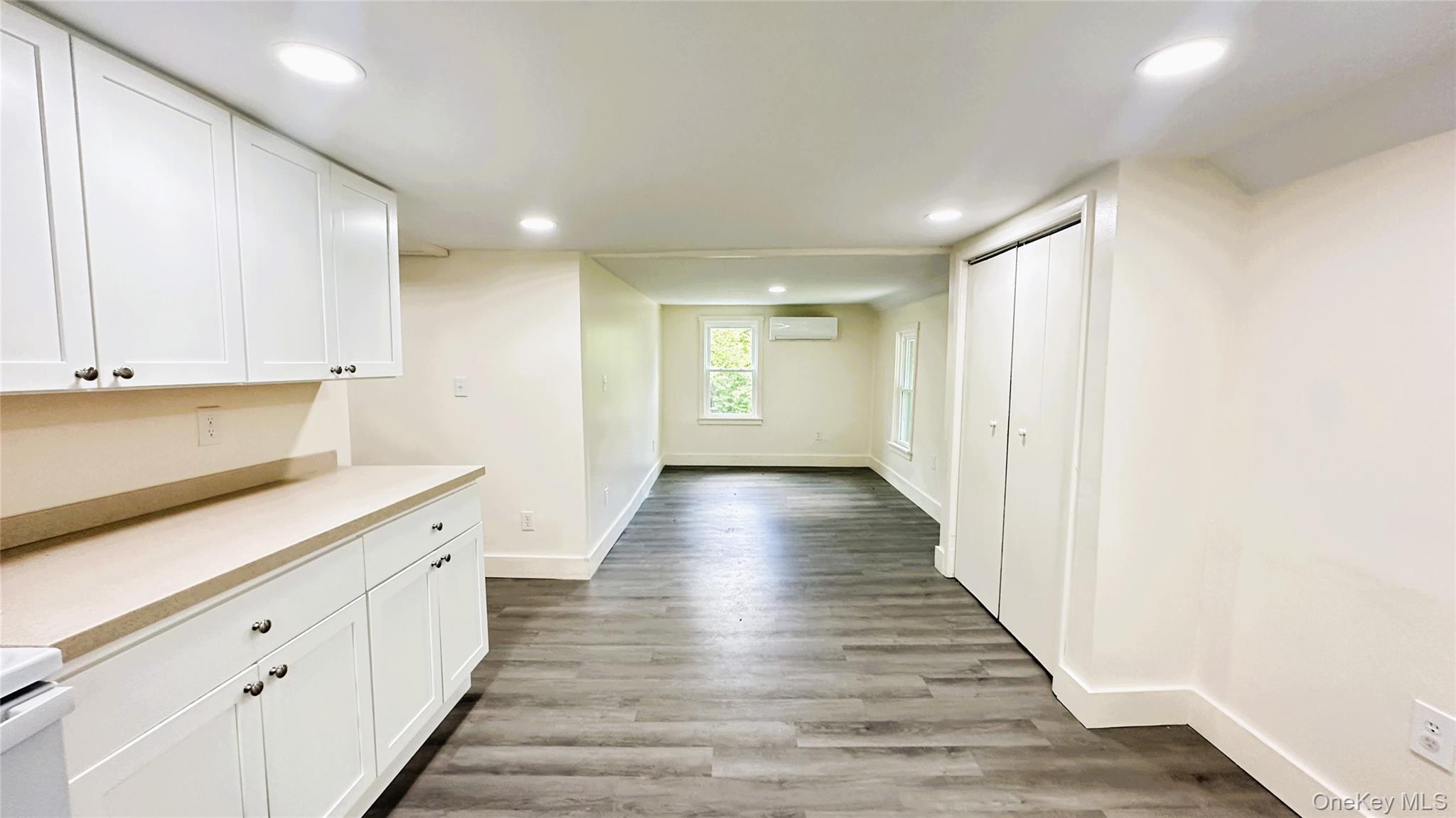 8 Marie Road, Unit 2 Highland, NY 12528 - Photo 4 of 15 a view of a hallway with wooden floor