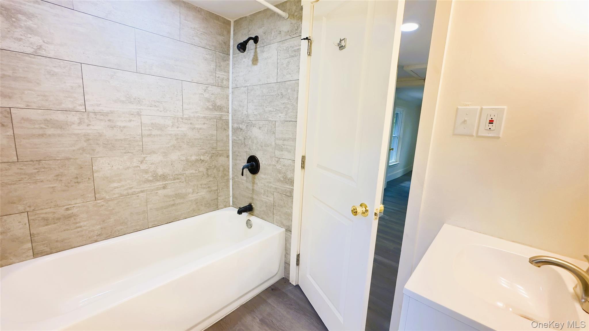 8 Marie Road, Unit 2 Highland, NY 12528 - Photo 9 of 15 a bathroom with a bathtub and shower