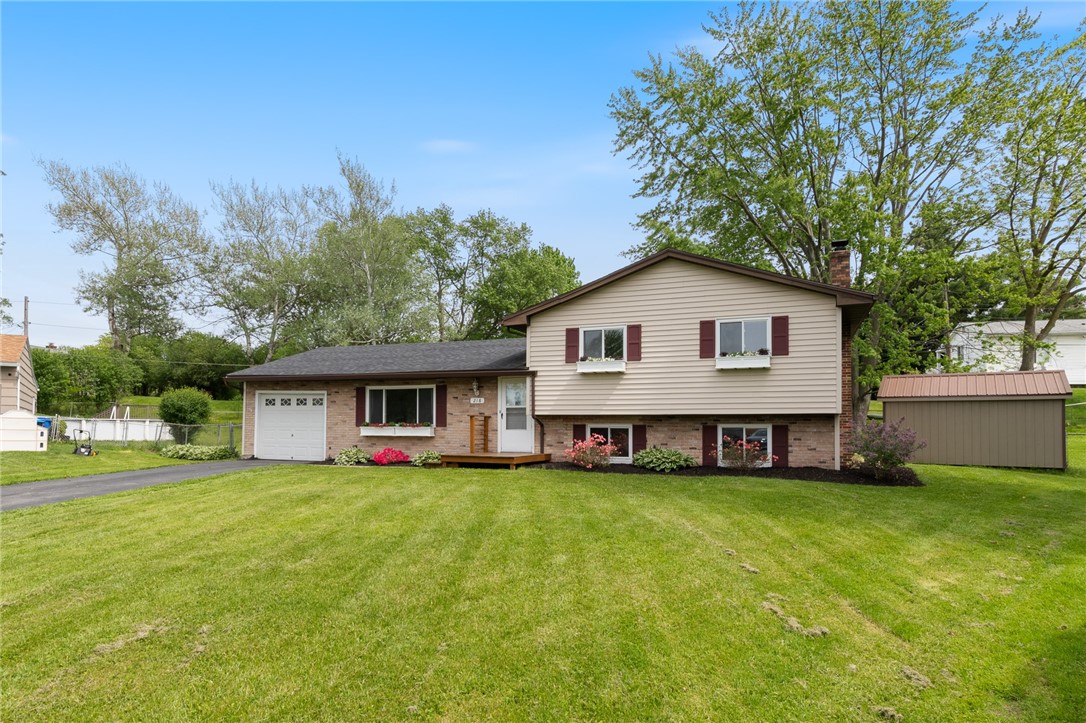 218 Kusak Road Henrietta, NY 14467 - Photo 2 of 33 Front of house with new shed.