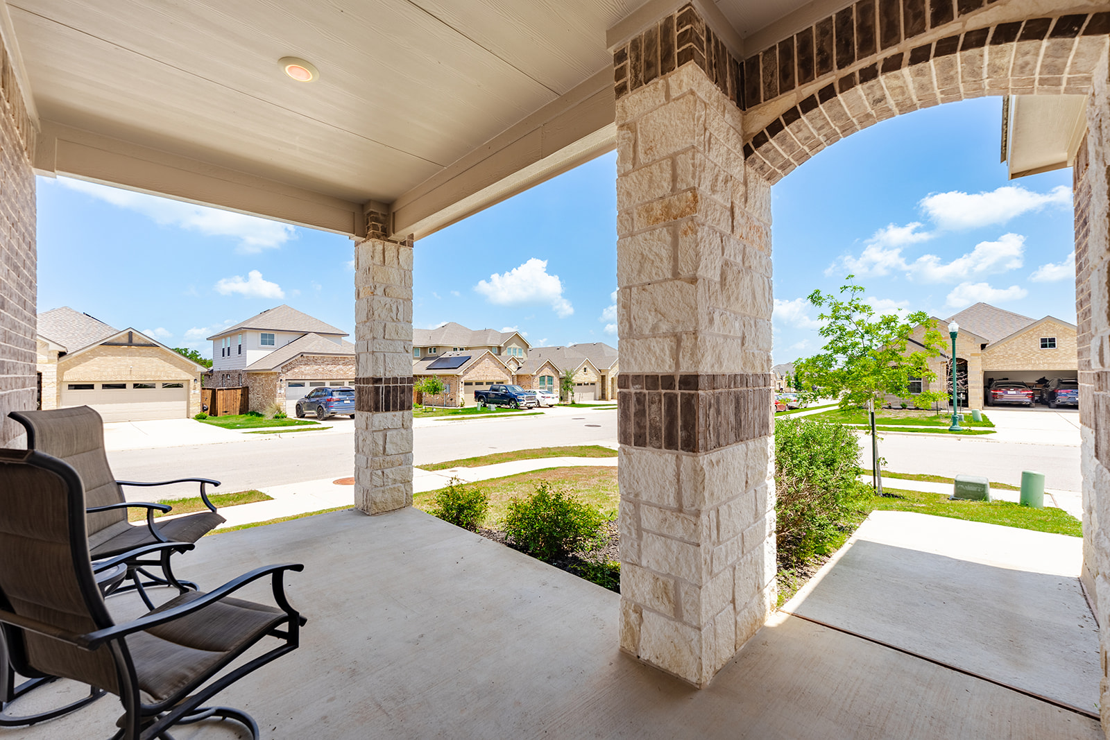 900 Balsora Cove Georgetown, TX 78628 - Photo 32 of 39 Relax on the covered porch, enjoying neighborhood views from this charming entry.