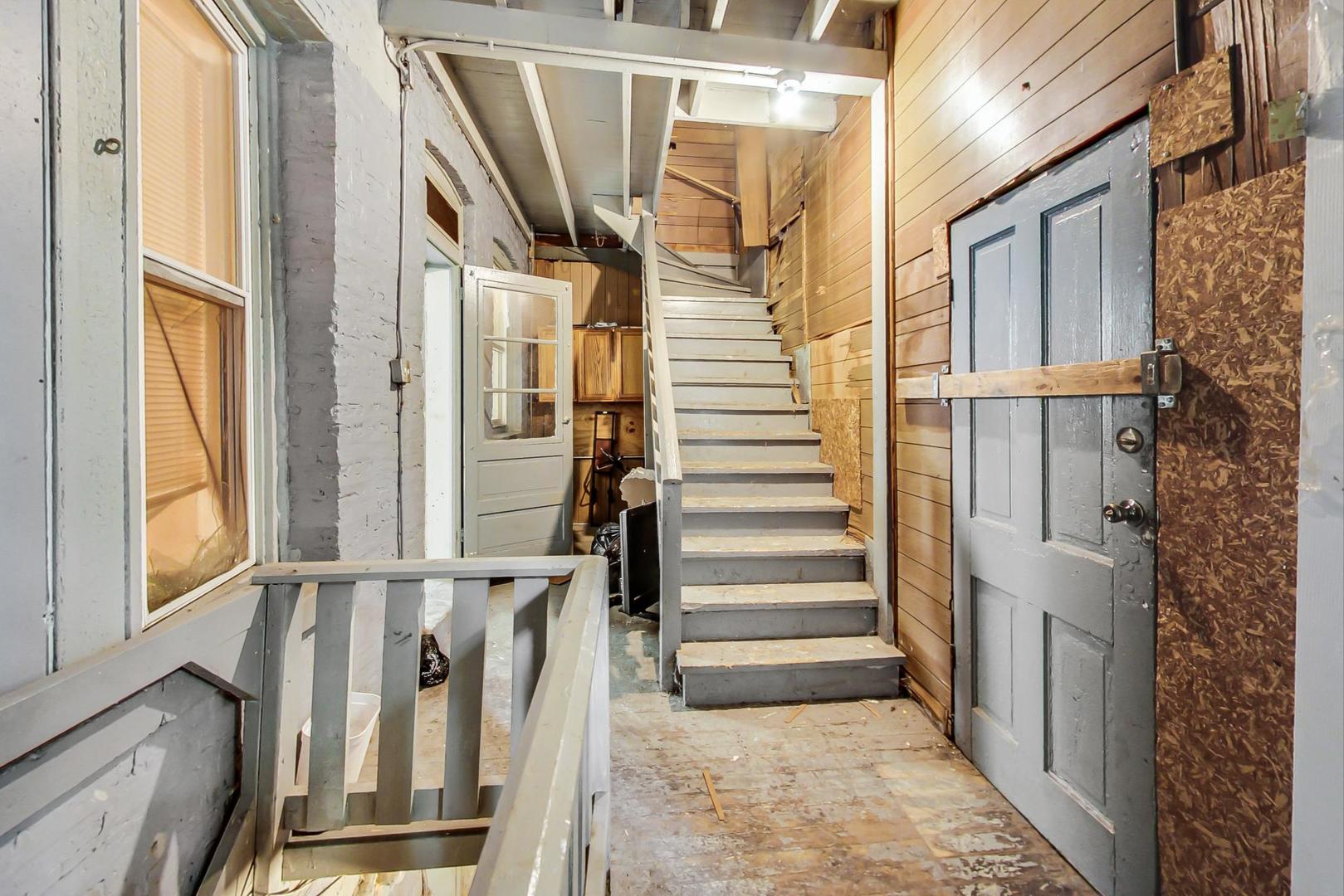 719 North Ridgeway Avenue Chicago, IL 60624 - Photo 25 of 58 a view of entryway with furniture and windows