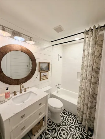 a view of a park with large trees