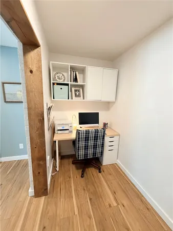 a storage room with wooden floor