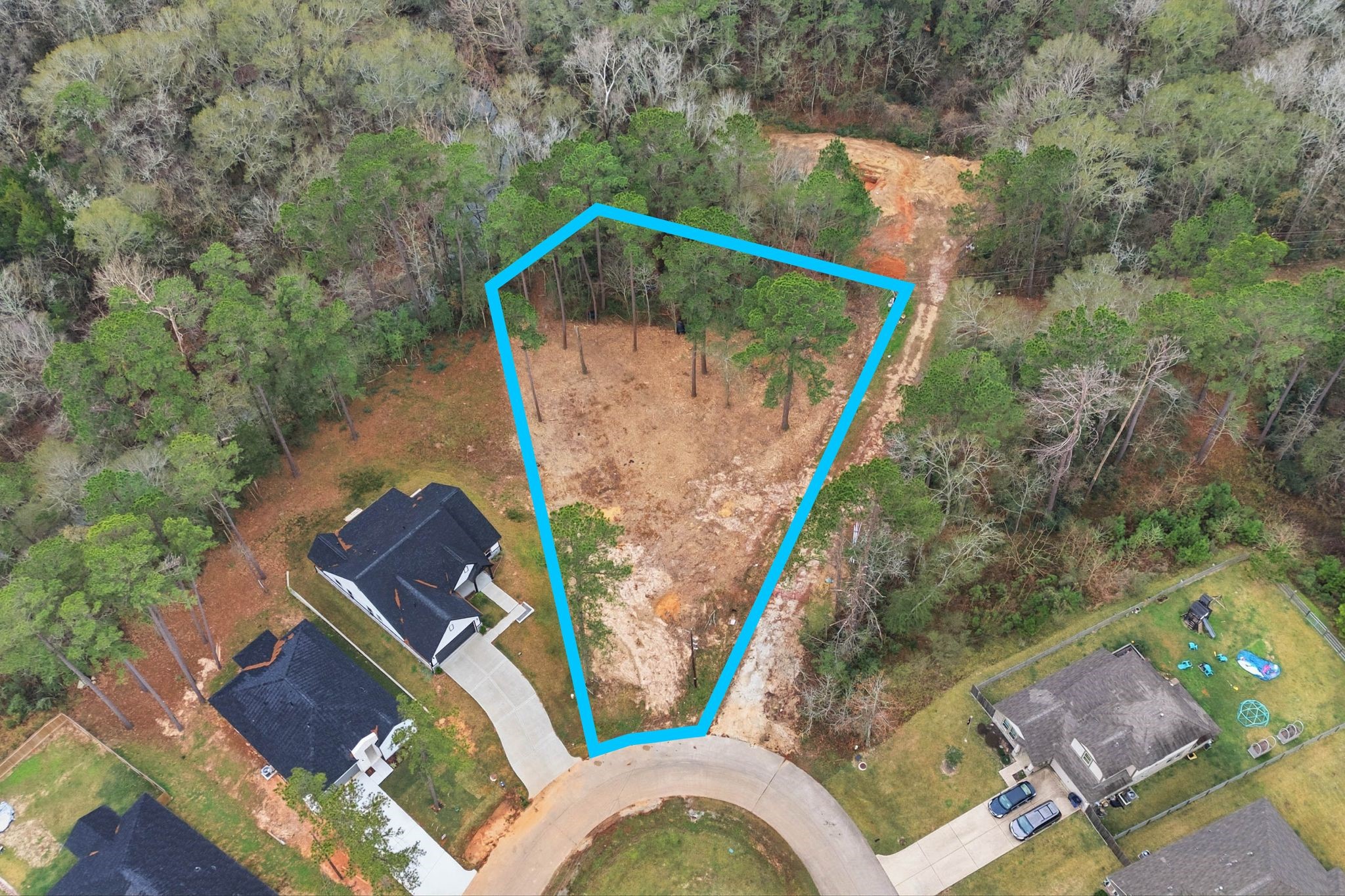 Tbd La Salle River Road Conroe, TX 77304 - Photo 2 of 8 an aerial view of a house with outdoor space