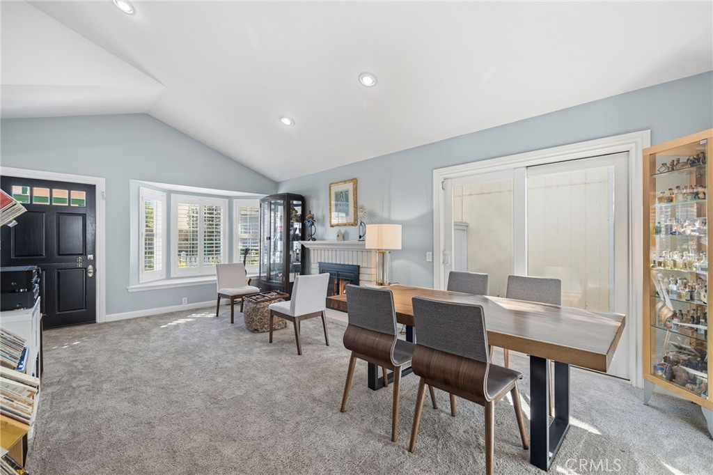 7 Spring Buck Irvine, CA 92614 - Photo 11 of 51 a view of a dining room with furniture window and outside view