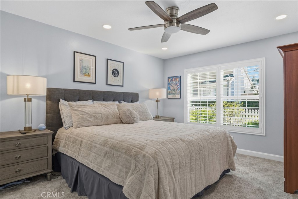 7 Spring Buck Irvine, CA 92614 - Photo 16 of 51 a bedroom with a large bed and a window