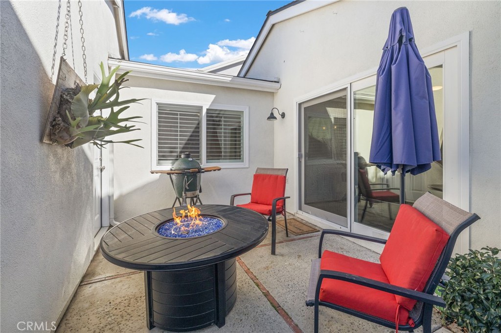 7 Spring Buck Irvine, CA 92614 - Photo 25 of 51 a view of a dining room with furniture and window