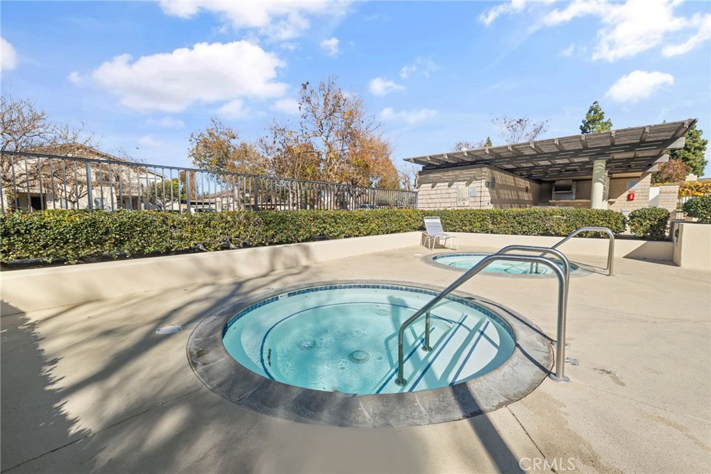 7 Spring Buck Irvine, CA 92614 - Photo 51 of 51 a view of a swimming pool with a terrace