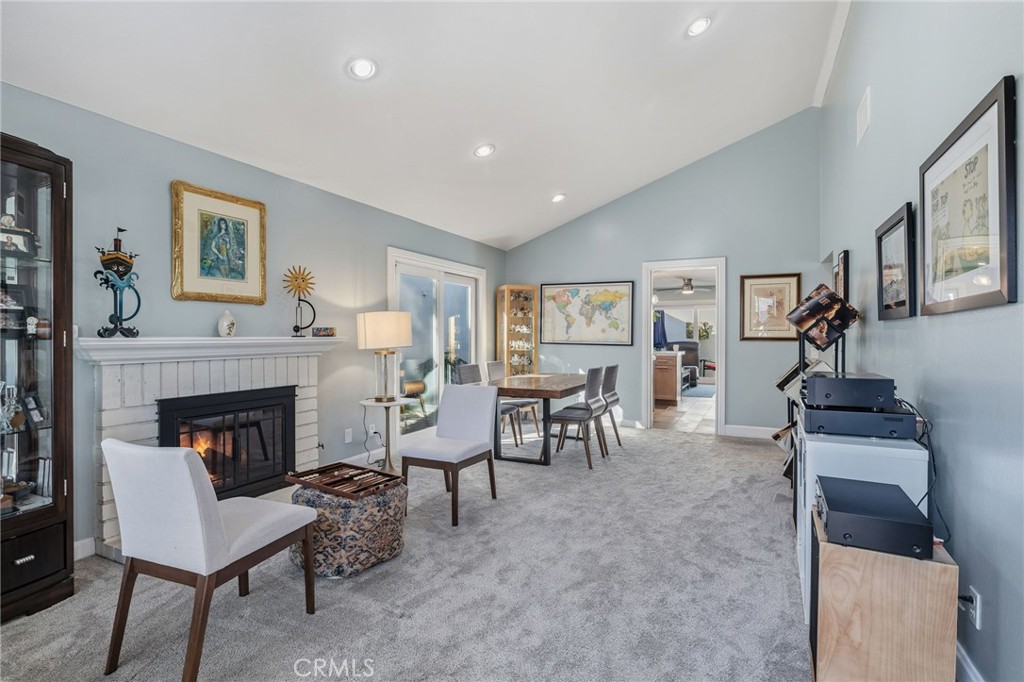 7 Spring Buck Irvine, CA 92614 - Photo 8 of 51 a living room with furniture and a fireplace