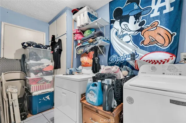 a bathroom with a glass shower door and a glass door